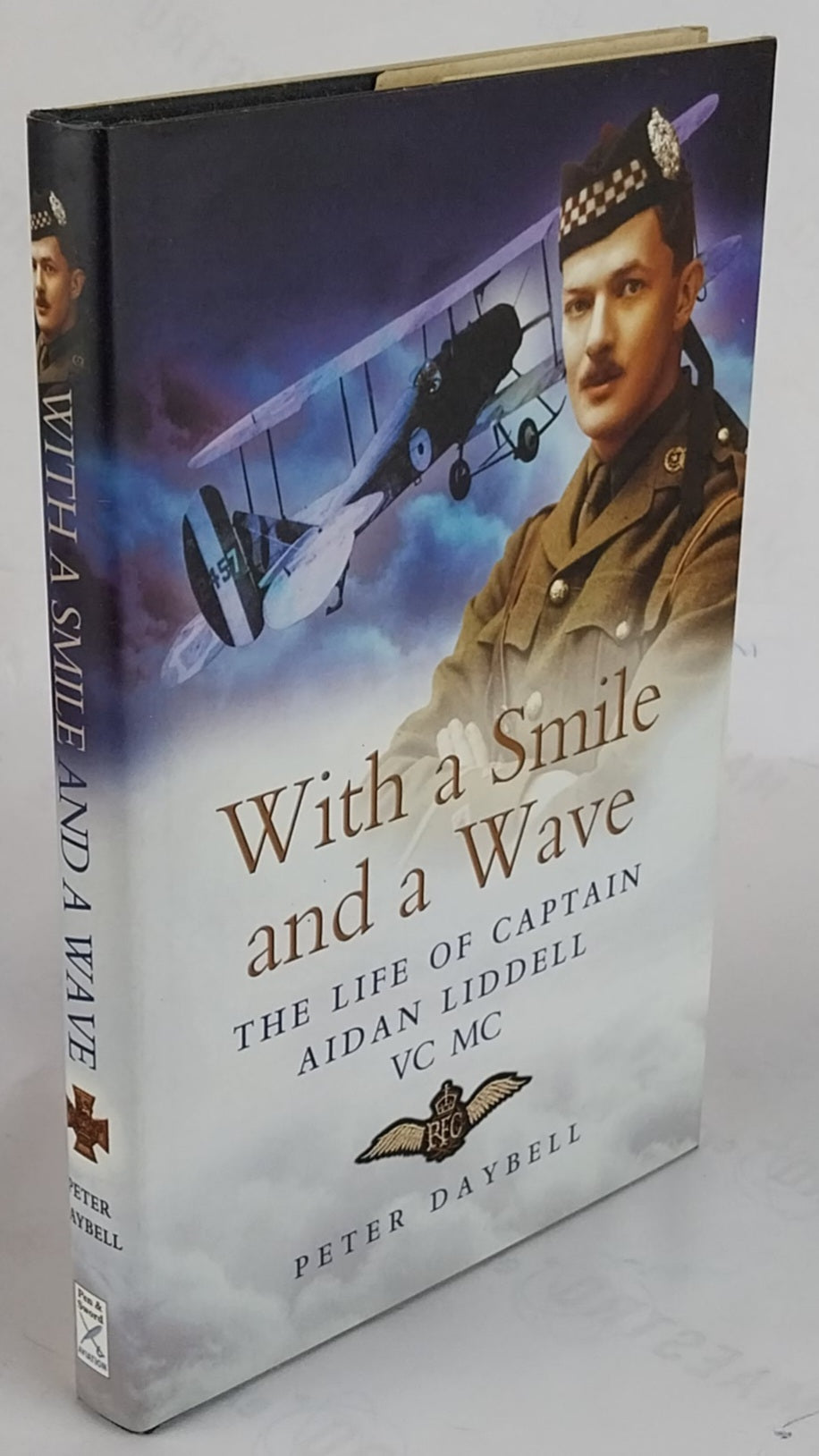 With a Smile and a Wave. The Life of Captain Aidan Liddell, VC. MC.